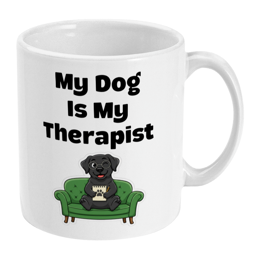 White mug with a dog on a green couch and text 'My Dog Is My Therapist' on a white background