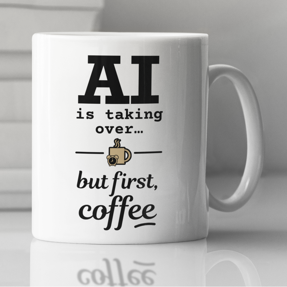 Mug with 'AI is taking over... but first, coffee' on a reflective surface.