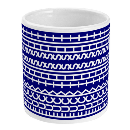 White mug with blue and white pattern on a white background