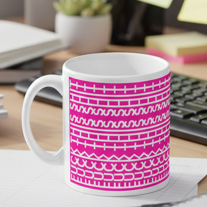 White mug with pink geometric pattern on a white background