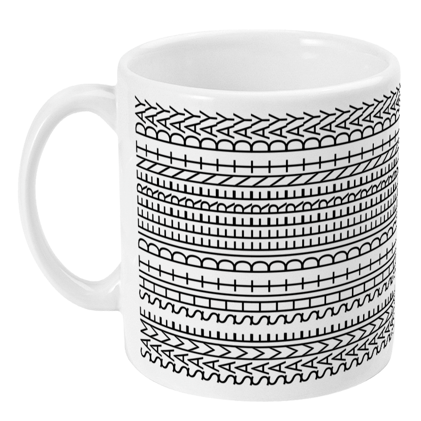 White mug with black geometric pattern on a white background