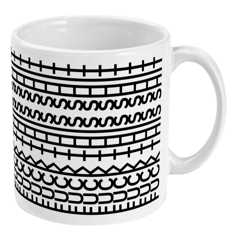 White mug with black geometric pattern on a white background