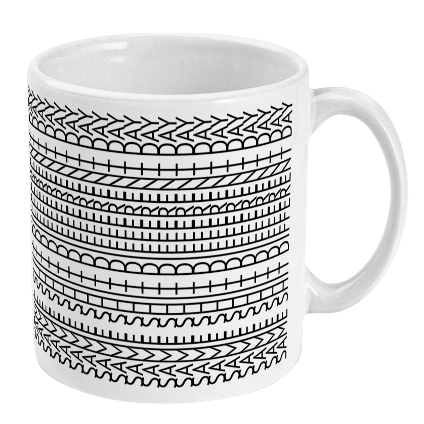 White mug with black geometric pattern on a white background