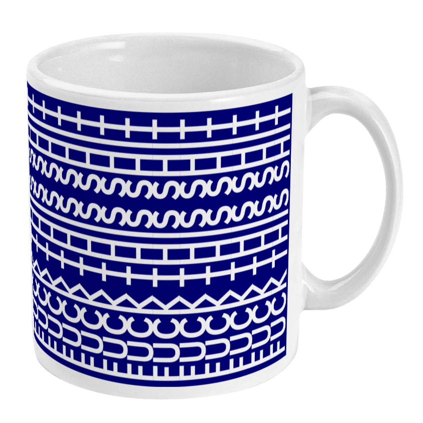 White mug with blue geometric pattern on a white background