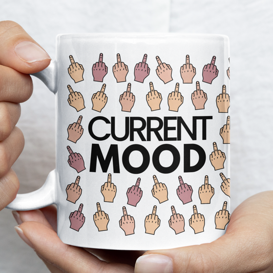 Person holding a mug with 'Current Mood' design featuring hand gestures.