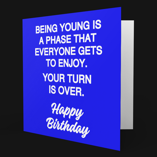 Blue birthday card with humorous message on a black background