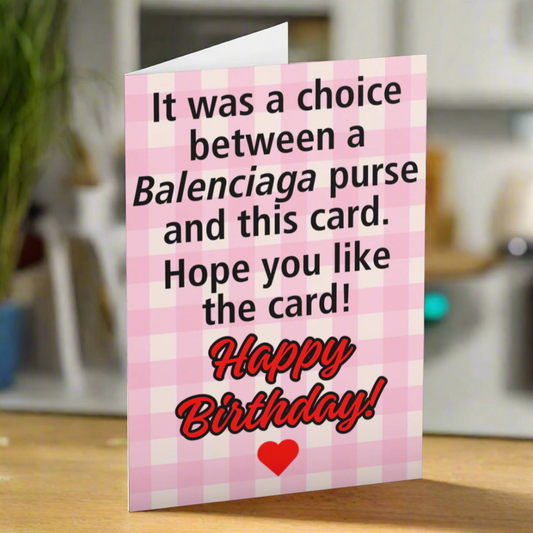 Pink birthday card with humorous text on a black background