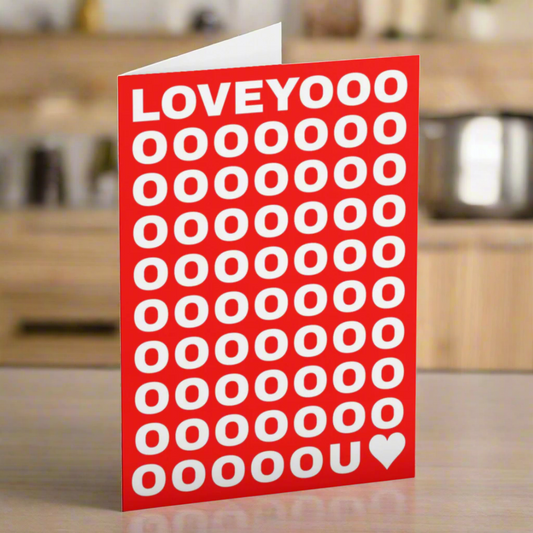 Red card with white text and heart on a blue background