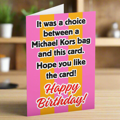 Birthday card with humorous text on a pink background