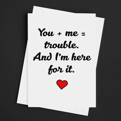 Two white cards with black text and a red heart on a black background
