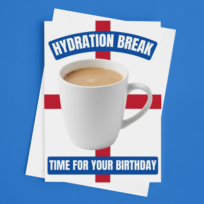 A birthday card featuring a white mug filled with coffee on a red cross background, with the text 'HYDRATION BREAK' at the top and 'TIME FOR YOUR BIRTHDAY' at the bottom, displayed against a solid blue background.