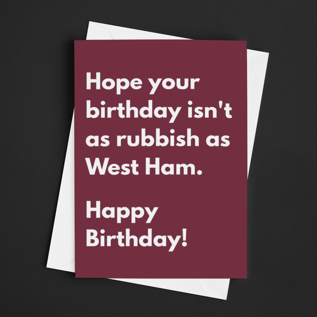 Maroon birthday card with humorous text on a black background