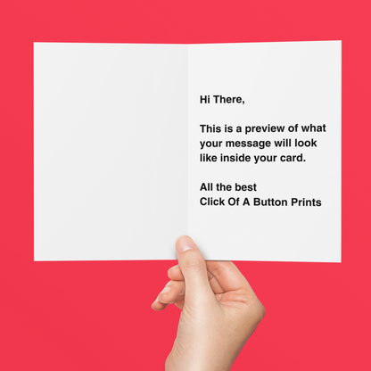 Hand holding a card with text on a red background