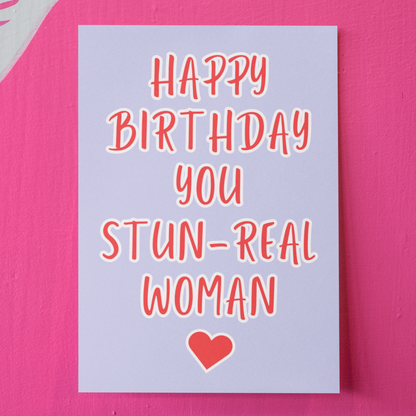 Birthday card with 'Happy Birthday You Stun-Real Woman' text on a pink background