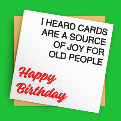 Birthday card with humorous text on a green background